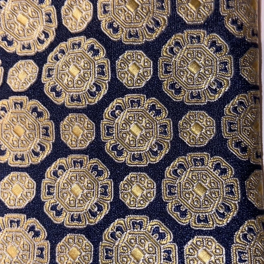 Zylos neck tie navy blue with gold medallion design.